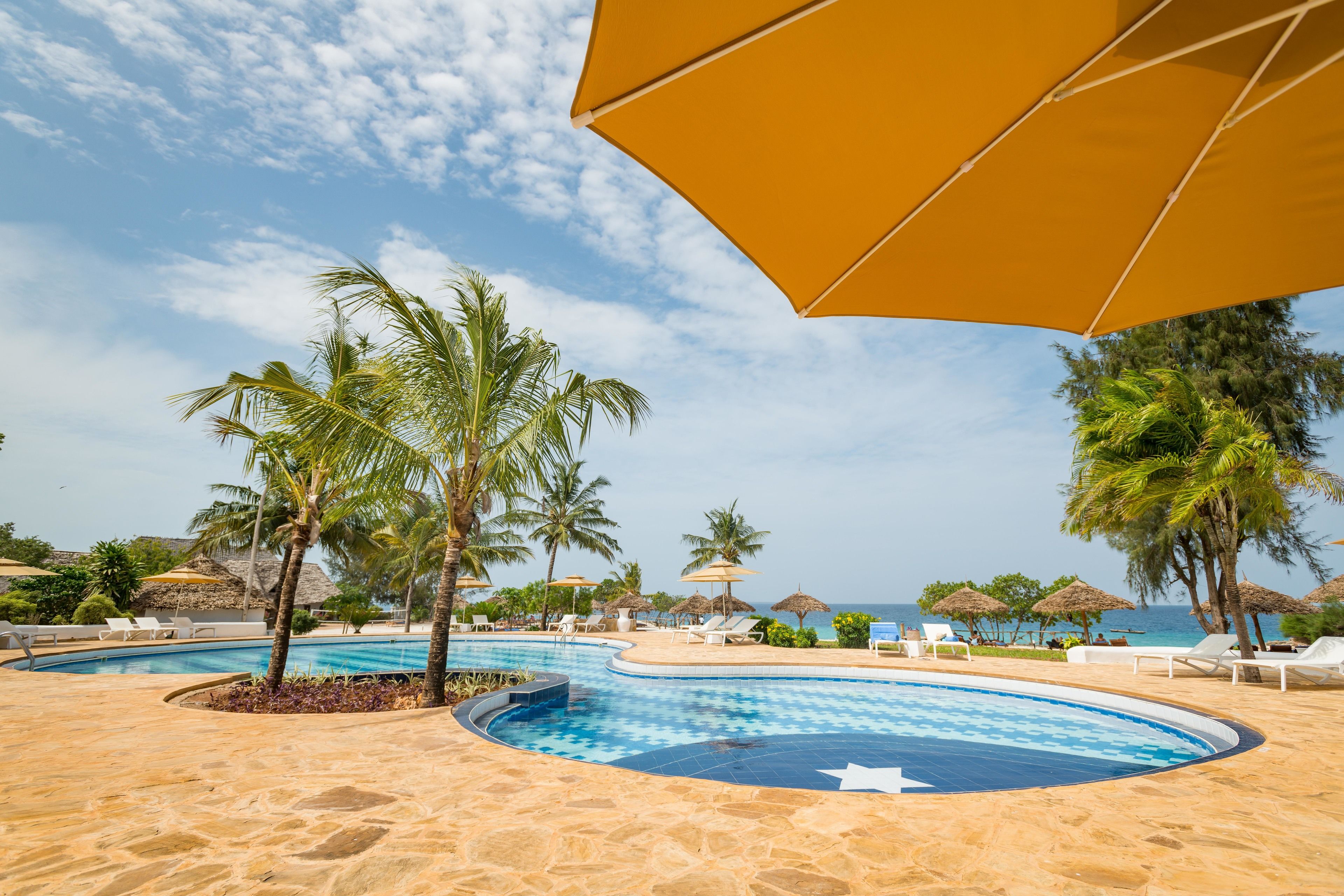 outdoor pool, pool umbrellas, pool loungers