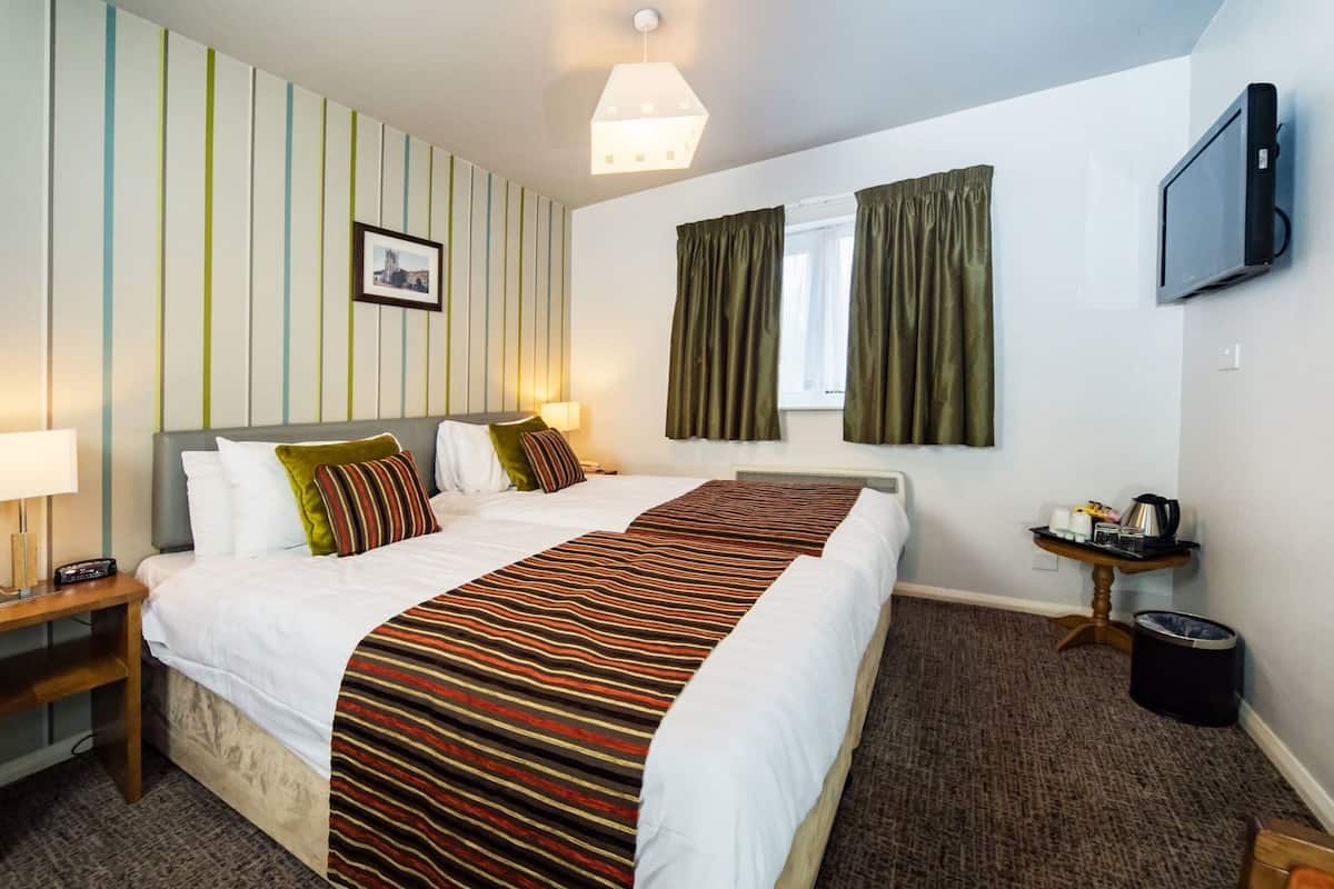In-room safe, desk, iron/ironing board (on request), cots/infant beds