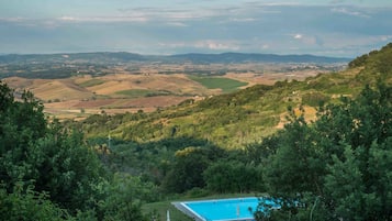 Outdoor pool, a rooftop pool, pool loungers