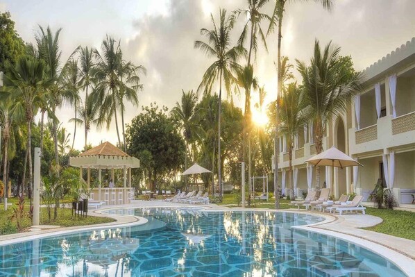 2 outdoor pools, open 6:00 AM to 6:00 PM, pool umbrellas, pool loungers