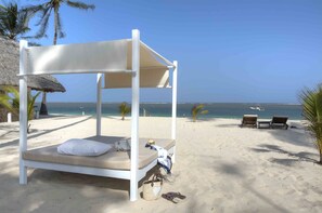 Private beach, white sand, sun-loungers, beach umbrellas