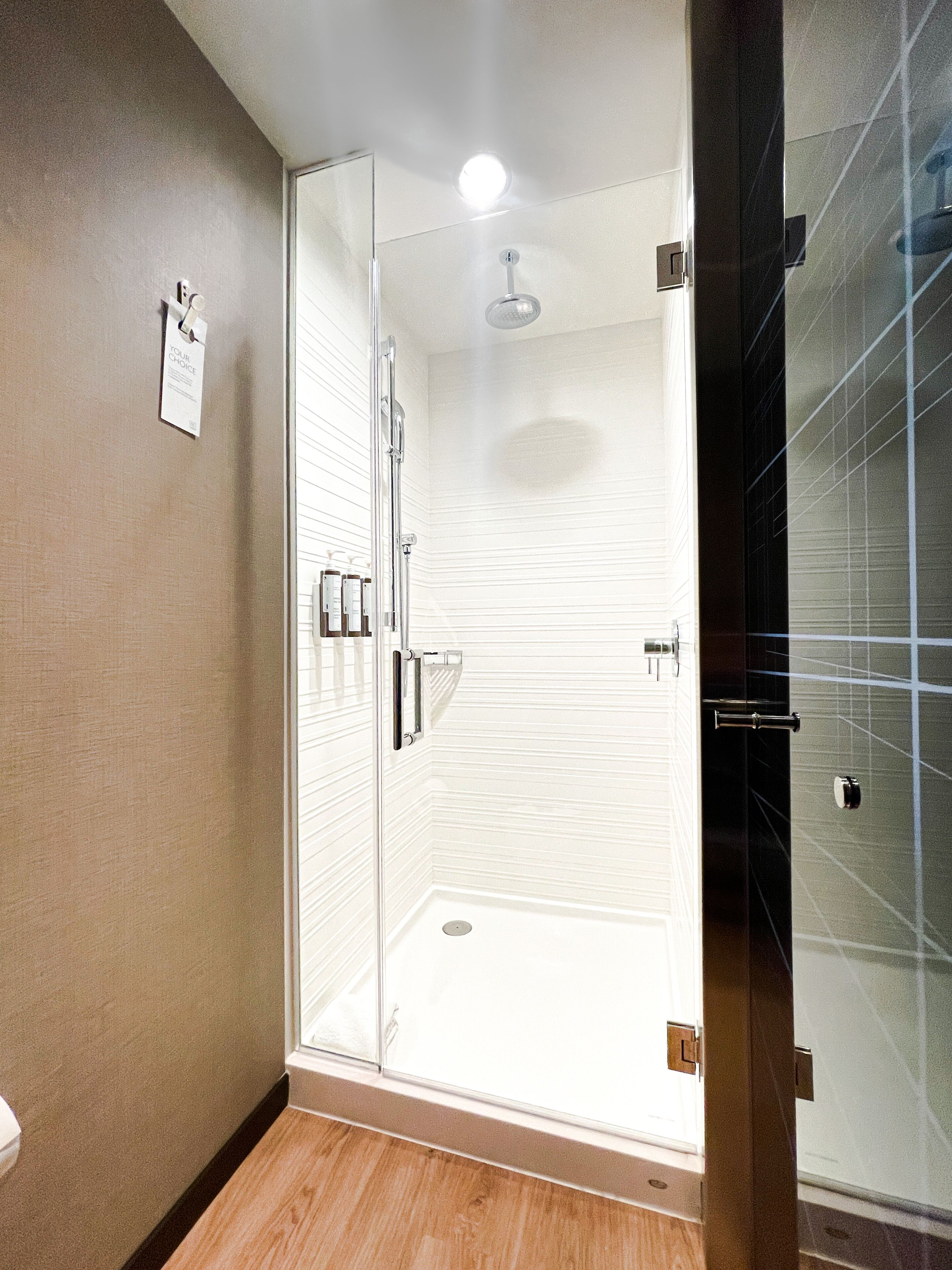 shower, rainfall showerhead, designer toiletries, hair dryer