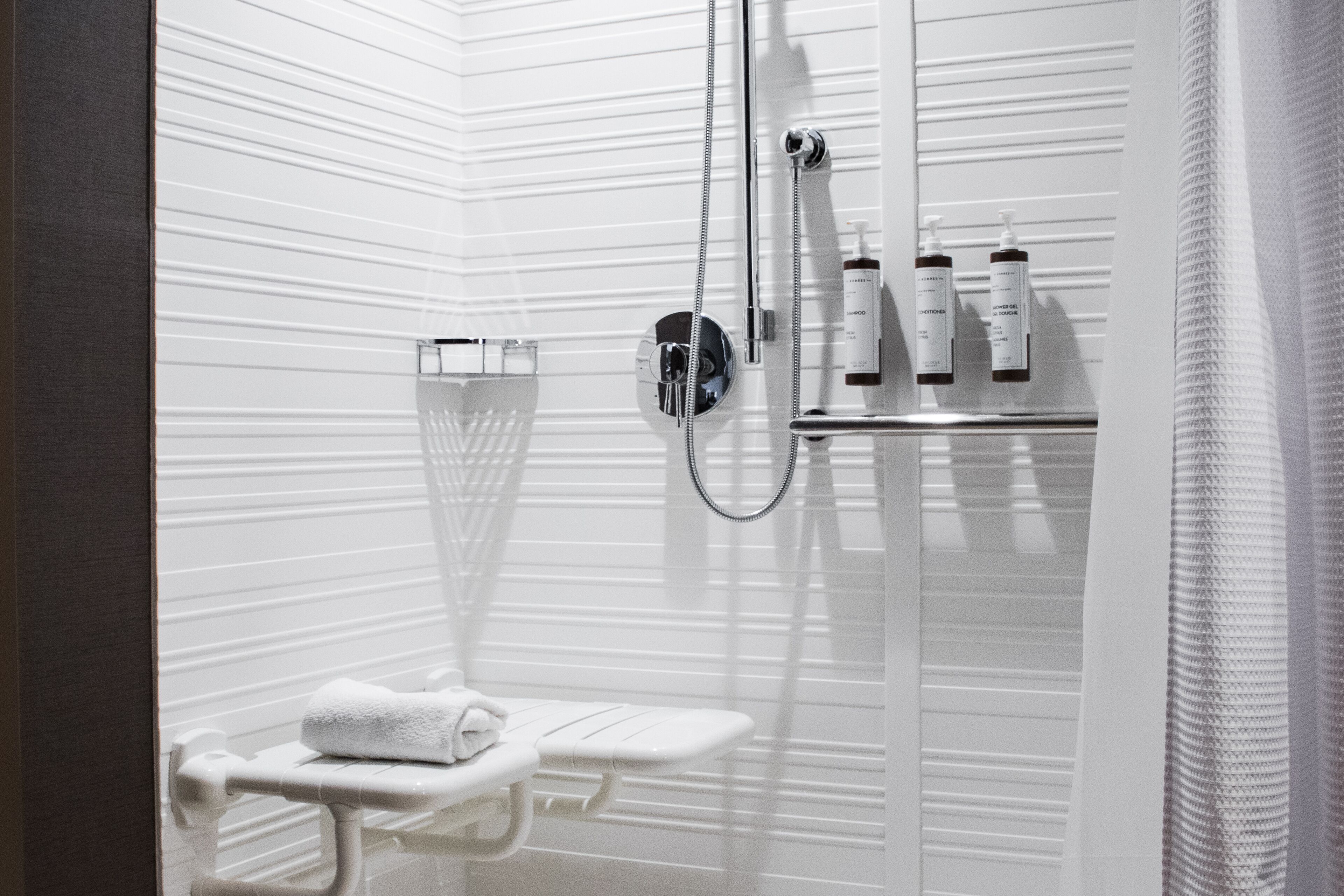 shower, rainfall showerhead, designer toiletries, hair dryer