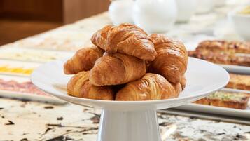 Daily buffet breakfast (USD 15 per person)