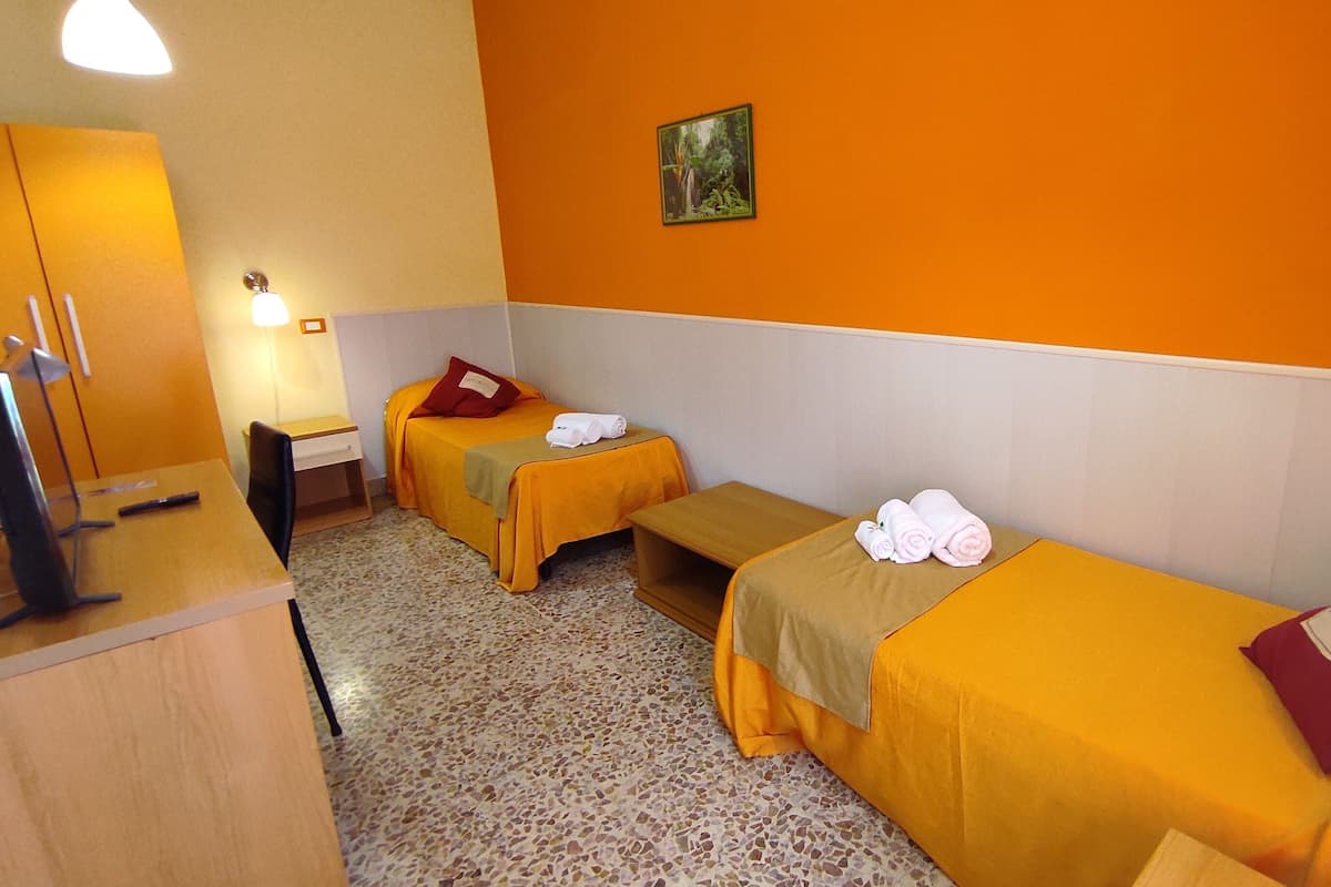 Basic Triple Room, 3 Single Beds | 1 bedroom, in-room safe, desk, blackout curtains