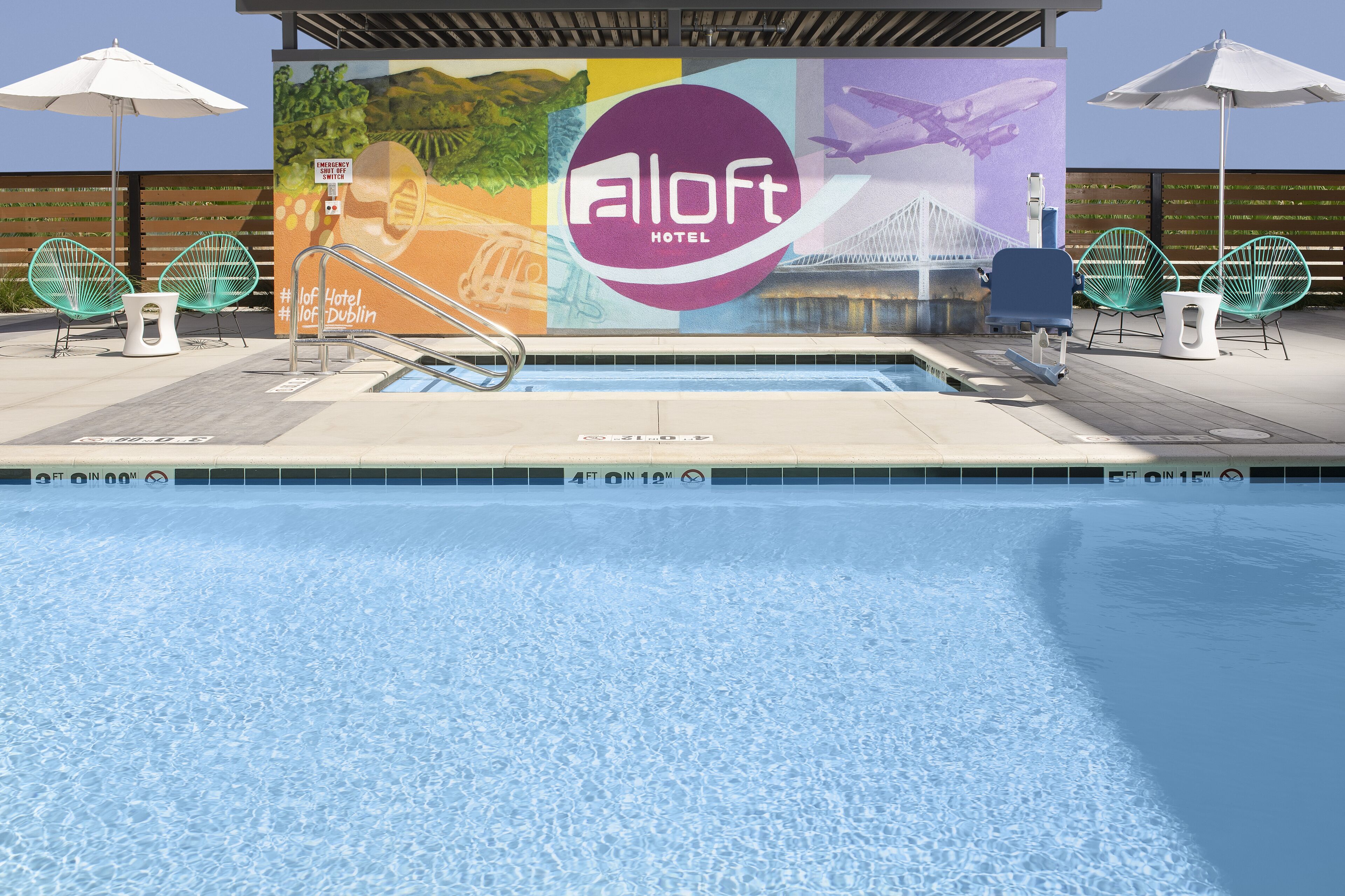 outdoor pool, open 8 am to 10 pm, pool umbrellas, pool loungers