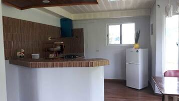 Apartment | Private kitchen | Full-sized fridge, stovetop, coffee/tea maker, cookware/dishes/utensils