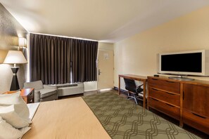 Standard Room, 1 King Bed, Non Smoking | Premium bedding, desk, laptop workspace, blackout drapes