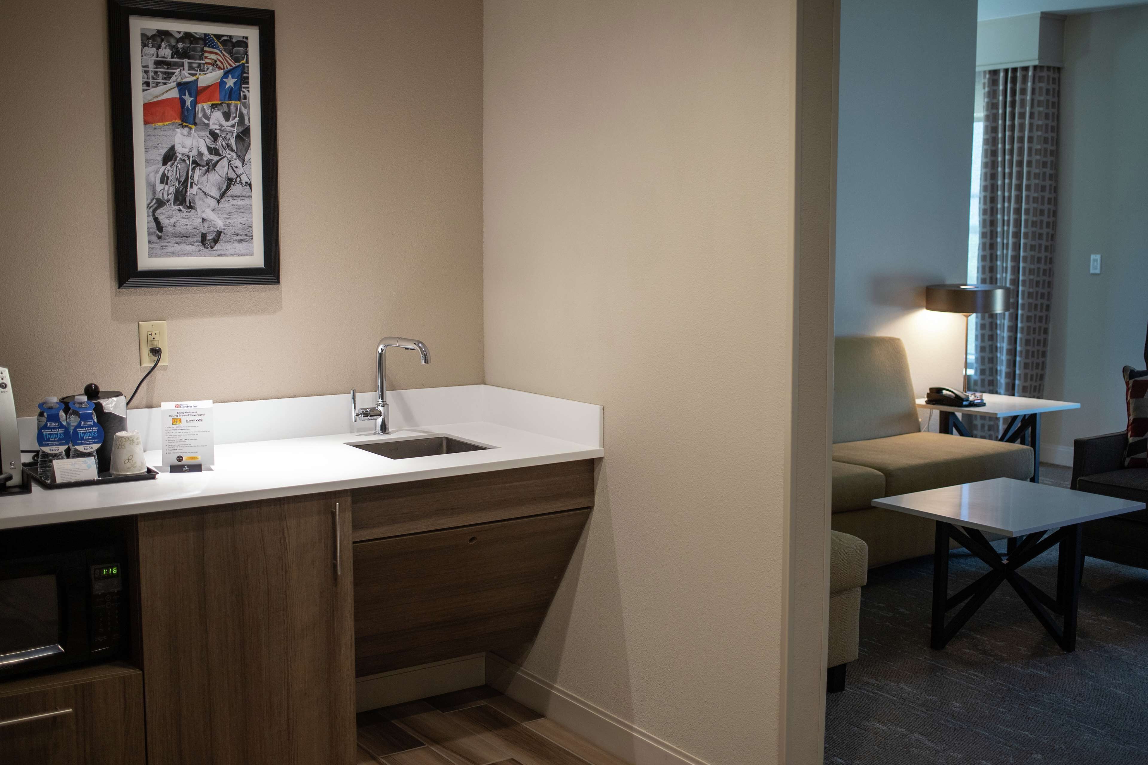 junior suite, 1 king bed, accessible (roll-in shower) | living area | 32-inch flat-screen tv with cable channels, tv