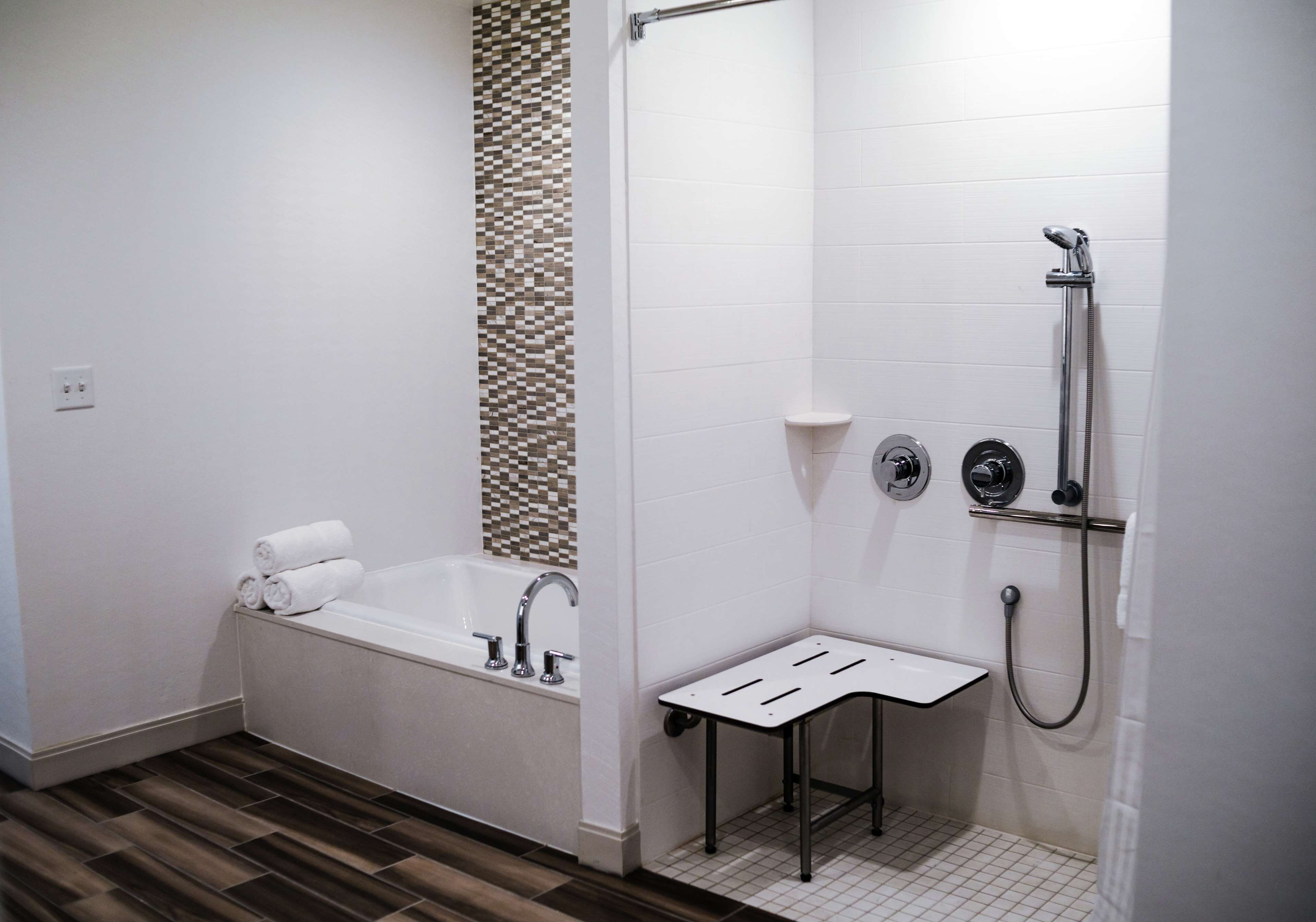 junior suite, 1 king bed, accessible (roll-in shower) | bathroom | free toiletries, hair dryer, towels, soap