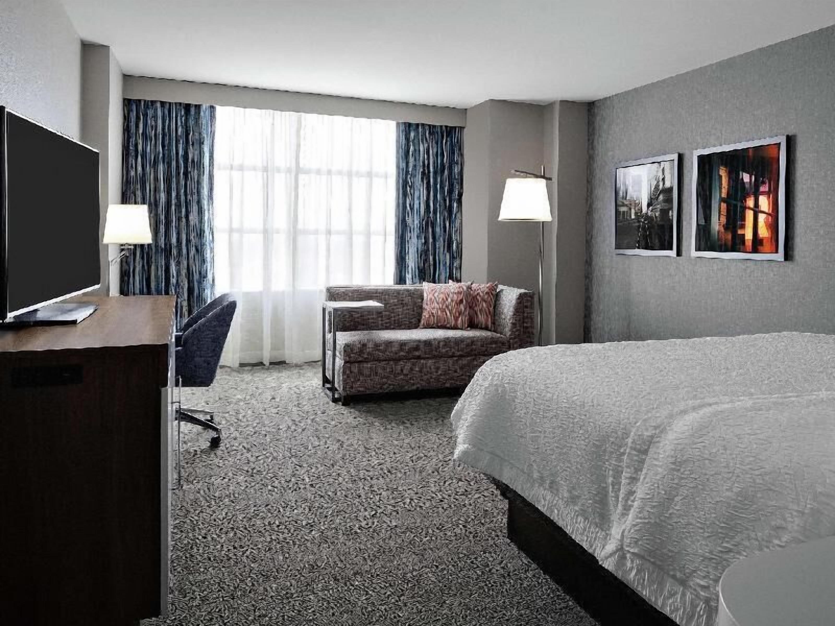 Premium bedding, desk, iron/ironing board, free cribs/infant beds