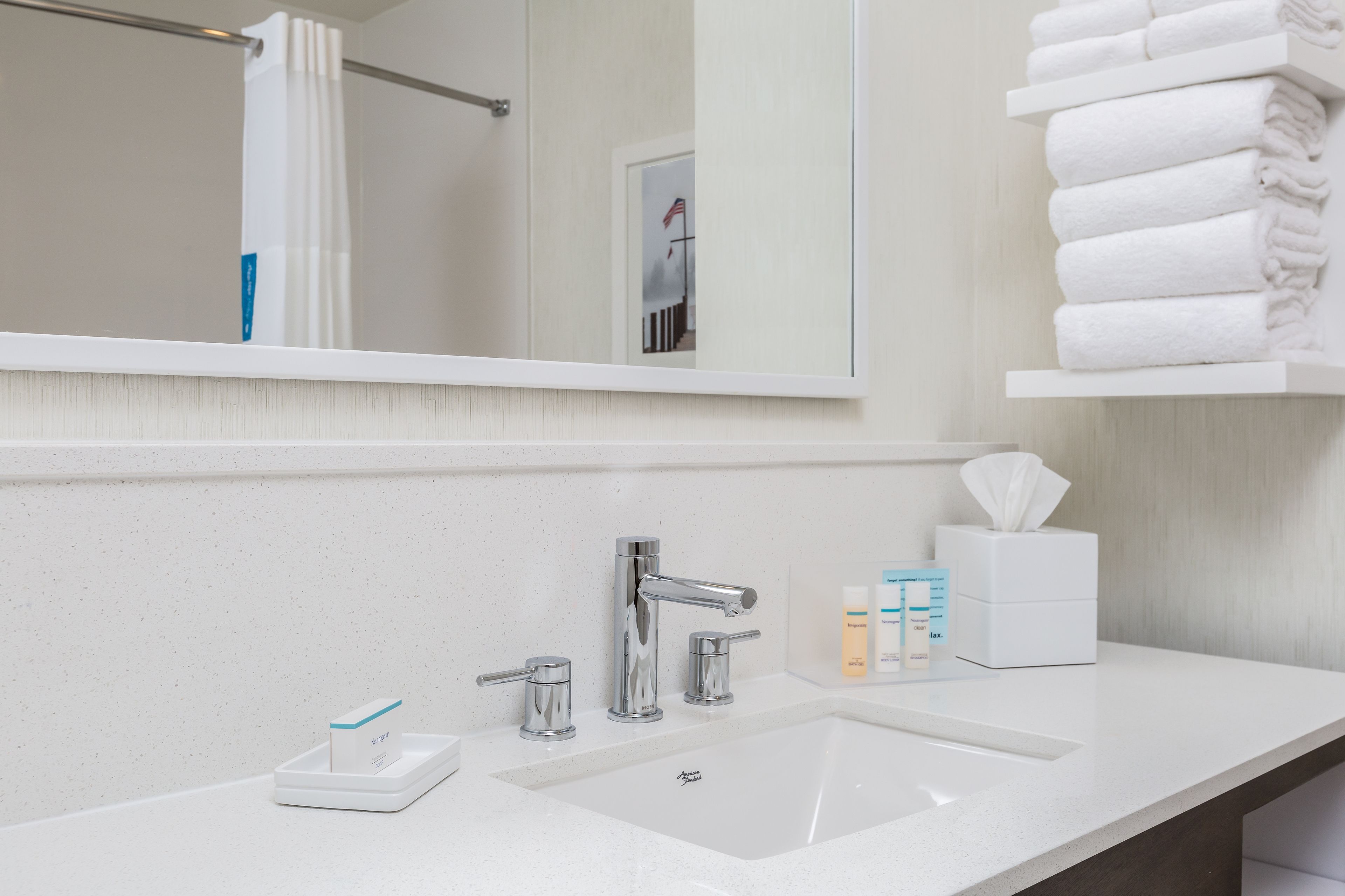 hair dryer, towels, soap, shampoo