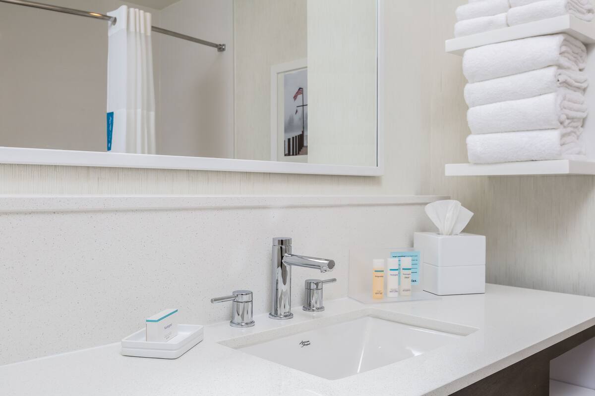 hair dryer, towels, soap, shampoo