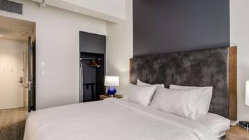 Premium bedding, laptop workspace, blackout drapes, iron/ironing board