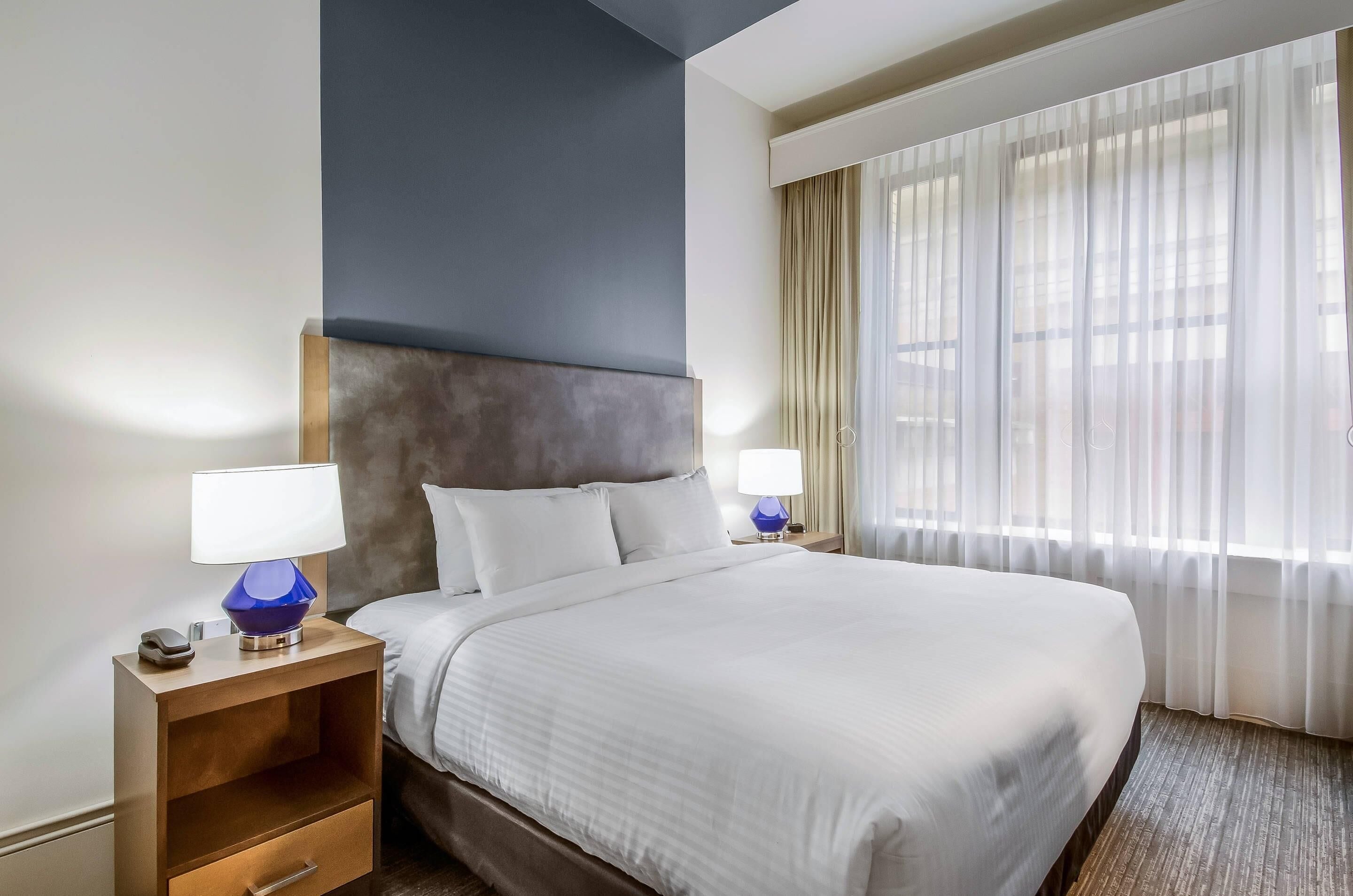 Suite, 1 King Bed with Sofa bed, Accessible, Non Smoking | Premium bedding, desk, laptop workspace, blackout drapes