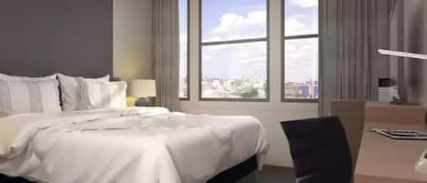 Premium bedding, laptop workspace, blackout curtains, iron/ironing board