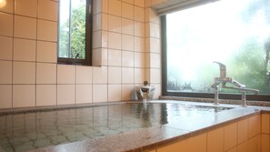 A bathroom with a bathtub, a window, and a faucet. - Auberge - A Ma Façon - (Kokonoe)