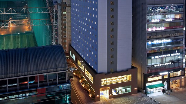 A high-rise hotel with a modern design, featuring a prominent vertical sign with Korean text. - Toyoko Inn Incheon Bupyeong (Incheon)