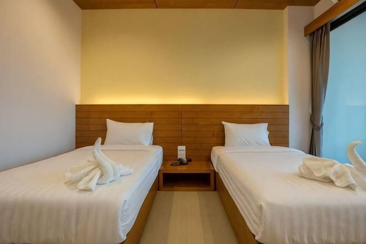 Desk, blackout drapes, rollaway beds (surcharge), WiFi (free)