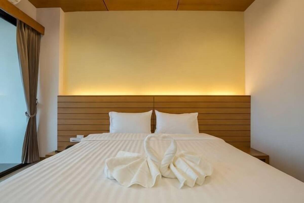 Desk, blackout drapes, rollaway beds (surcharge), WiFi (free)