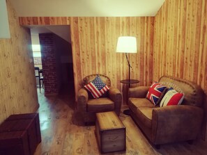 Loft | Área de sala de estar | Televisión 