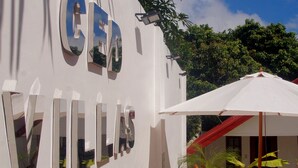 A building with the name 'CED VILLAS' displayed prominently. - CED Villas (El Nido)