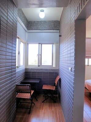 Standard Double Room | Living area | Flat-screen TV