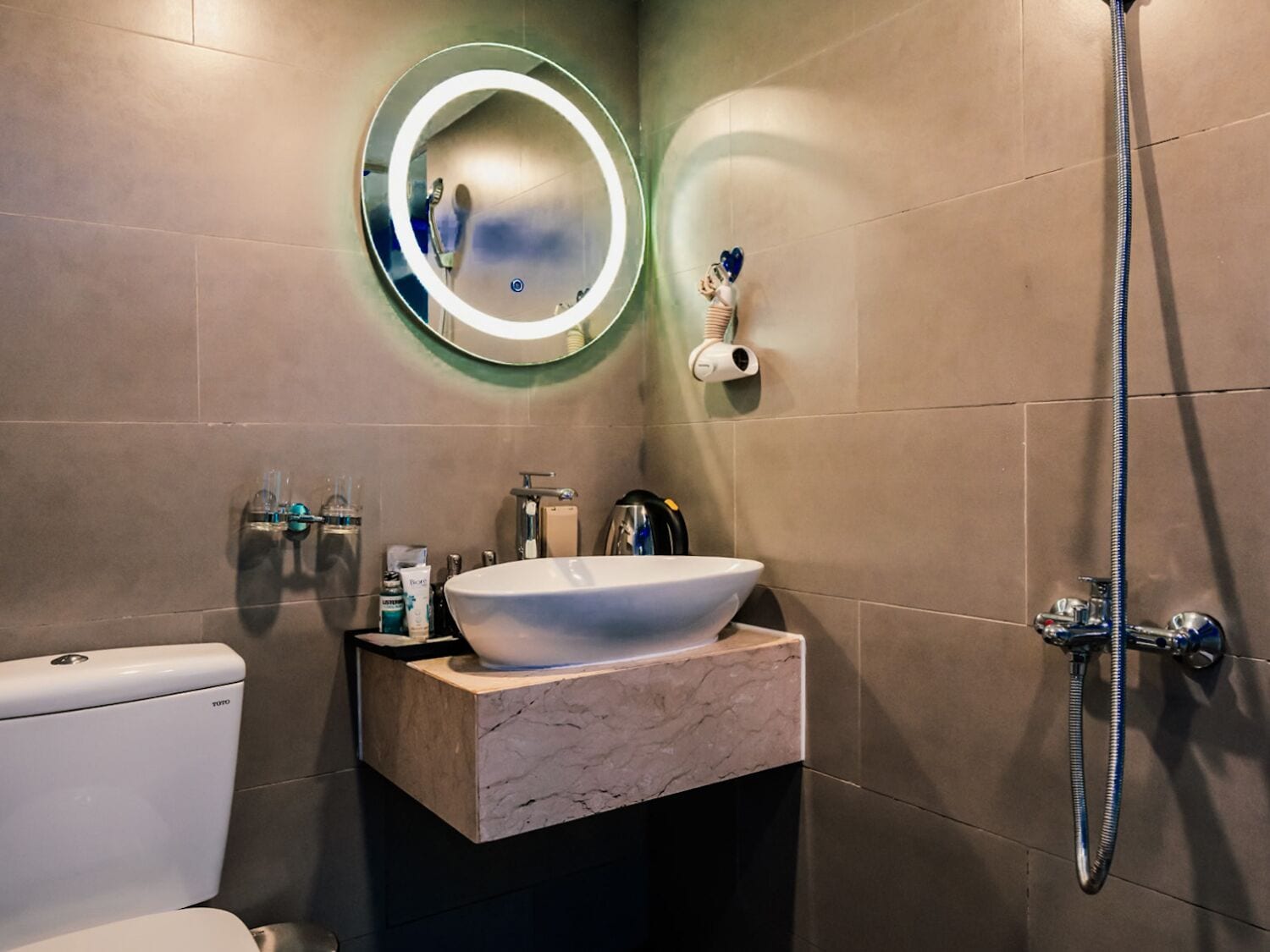 free toiletries, hair dryer, slippers, bidet