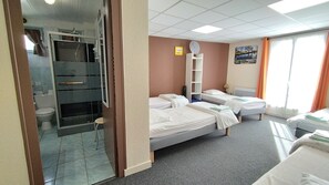 Blackout curtains, free cots/infant beds, free WiFi, bed sheets