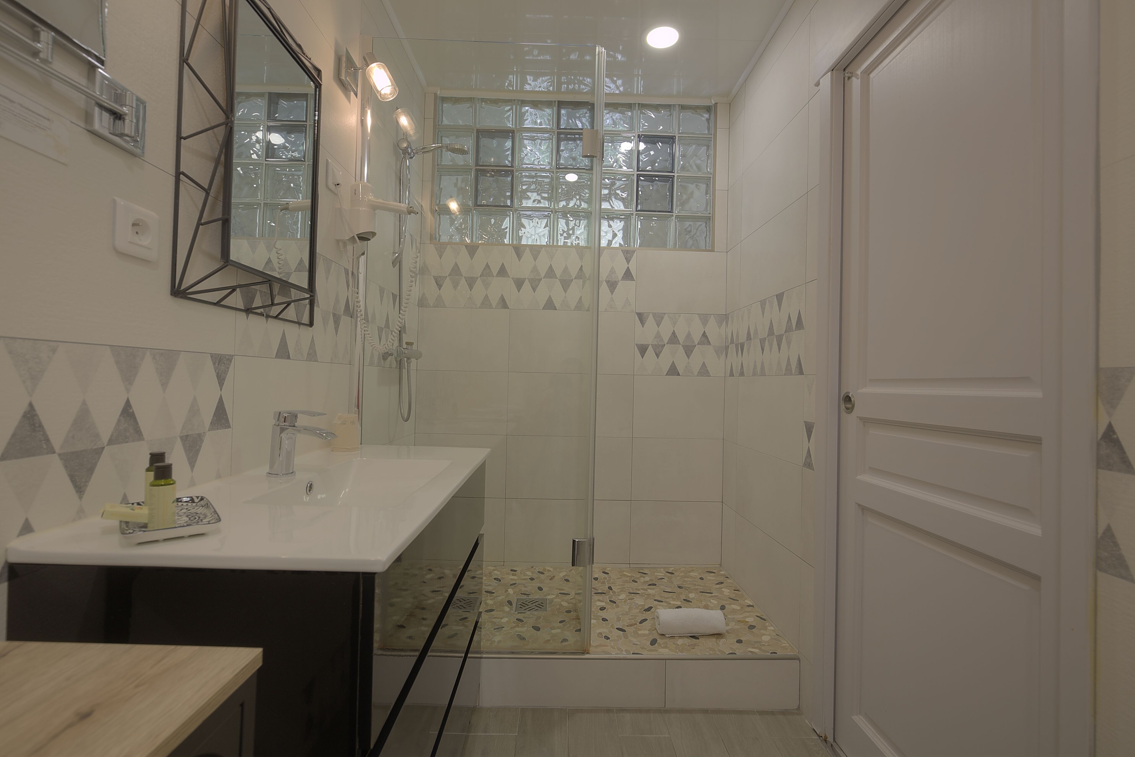 family room | bathroom | shower, free toiletries, hair dryer, towels