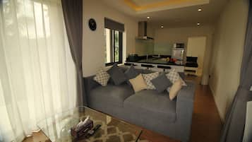Luxe villa | Woonkamer | Flatscreentelevisie