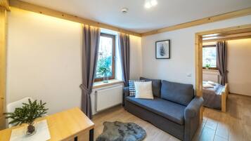 Standard Apartment | Living area | Flat-screen TV