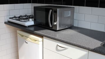 Apartemen, 3 kamar tidur | Dapur pribadi | Lemari es, microwave, oven, dan kompor