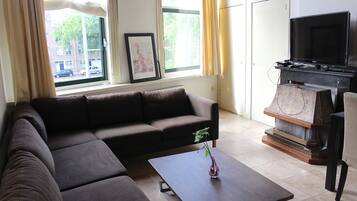 Apartment, 3 Bedrooms | Living room | Flat-screen TV