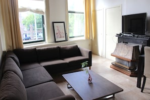 Apartment, 3 Bedrooms | Living room | Flat-screen TV - MyCityLofts - Noordplein (Rotterdam)