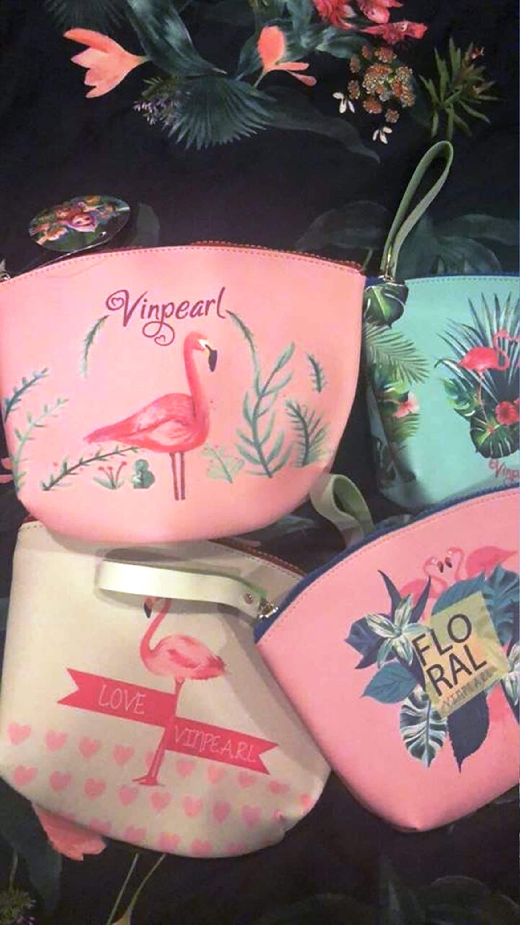 Three bags with floral designs and the name "Vinpearl" on them.