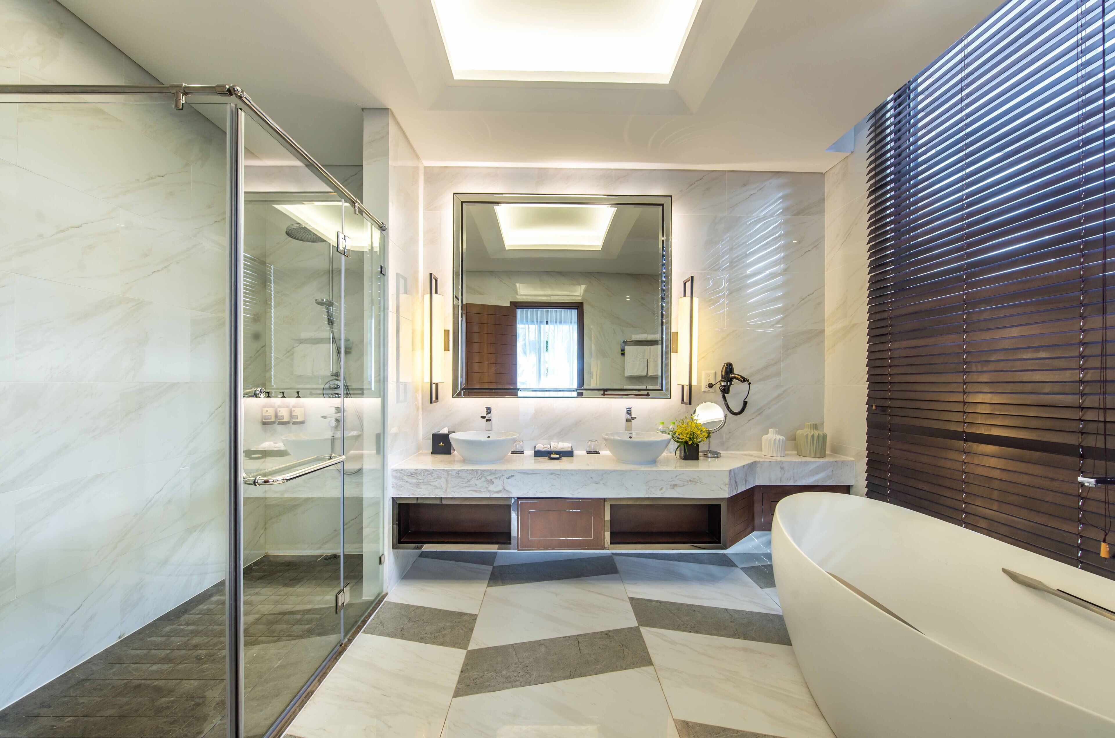 separate bathtub and shower, deep-soaking bathtub, rainfall showerhead