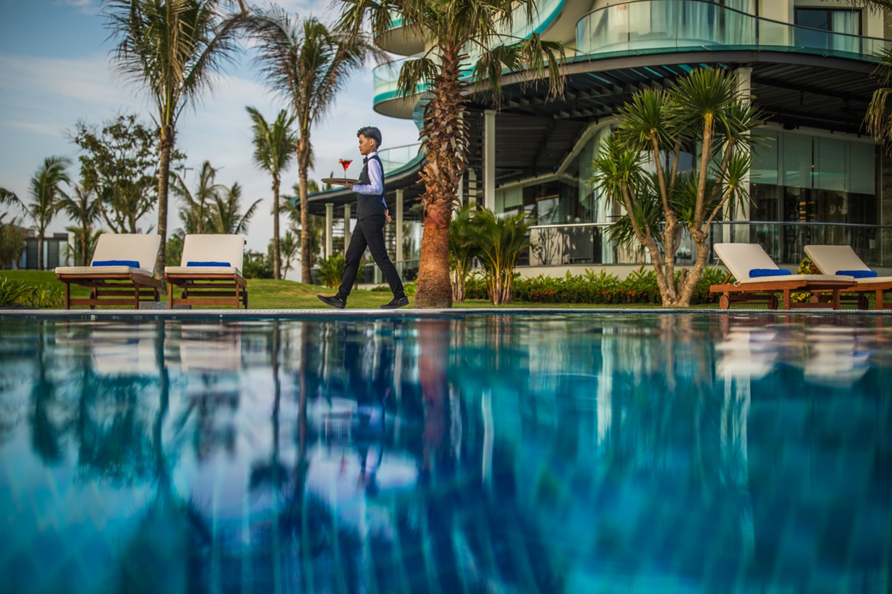 outdoor pool, pool umbrellas, pool loungers