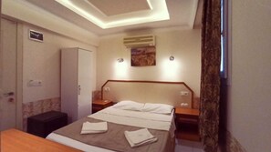 1 bilik tidur, peralatan tempat tidur premium, bar mini, meja 
