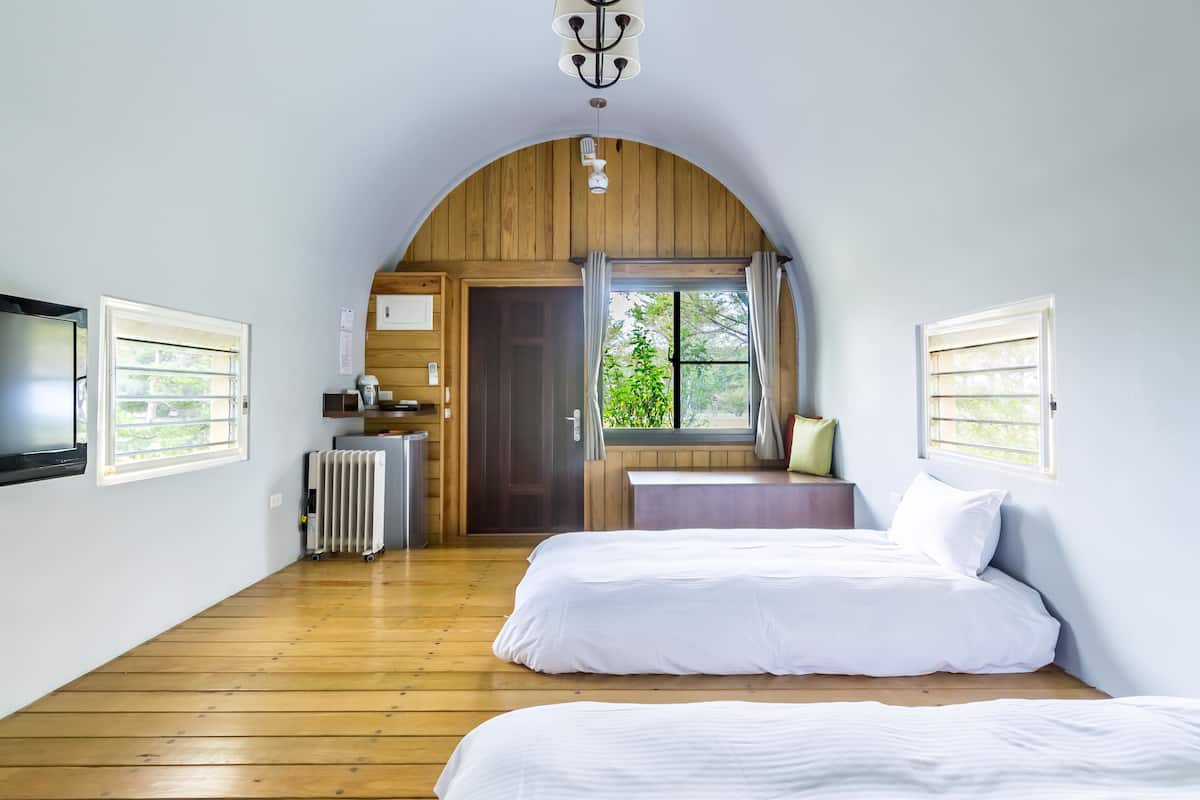 Deluxe Cabin, 1 Bedroom, Courtyard Area | 1 bedroom, desk, blackout drapes, rollaway beds