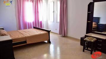 ファミリー アパートメント 2 ベッドルーム | 1 室のベッドルーム、防音設備、WiFi (無料)、ベッドシーツ