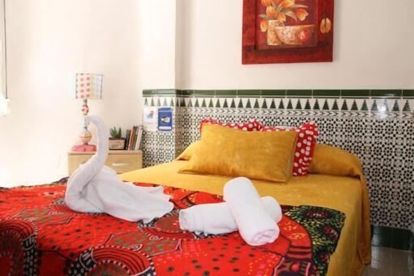 Desk, laptop workspace, blackout curtains, rollaway beds