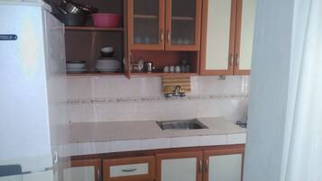 Apartment, 2 Bedrooms | Private kitchenette | Full-sized fridge, stovetop, cookware/dishes/utensils