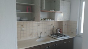 Apartment, 2 Bedrooms | Private kitchenette | Full-size fridge, stovetop, cookware/dishes/utensils