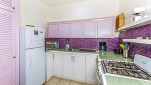 Design Apartment, 2 Bedrooms, Non Smoking | Private kitchen | Coffee/tea maker, full-size fridge, microwave, oven - Estrellas del Pacifico 5 (Tamarindo)