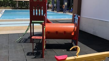 Relax by the pool and let kids play on the adjacent playground with a slide and swing.