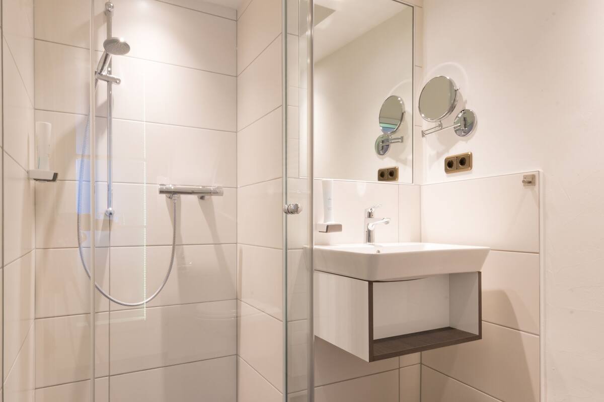 superior double room, non smoking, courtyard area | bathroom | shower, free toiletries, hair dryer, towels