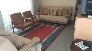 Apartemen, 2 kamar tidur | Area keluarga | TV