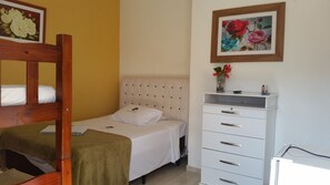 Suíte família (Ventilador) | Frigobar, cortinas blackout, Wi-Fi de cortesia, roupa de cama