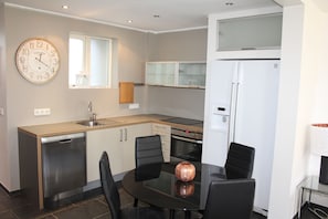 Comfort Apartment, 1 Bedroom (A) | Private kitchen | Full-size fridge, microwave, oven, stovetop